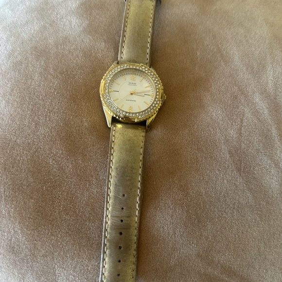 Elegant Gold and Silver Watch with Crystal Accents